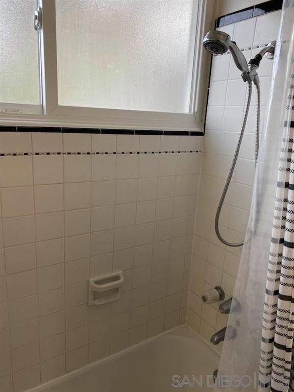 317 Prospect Street La Jolla, CA 92037 - Photo 14 of 24 a bathroom with a shower