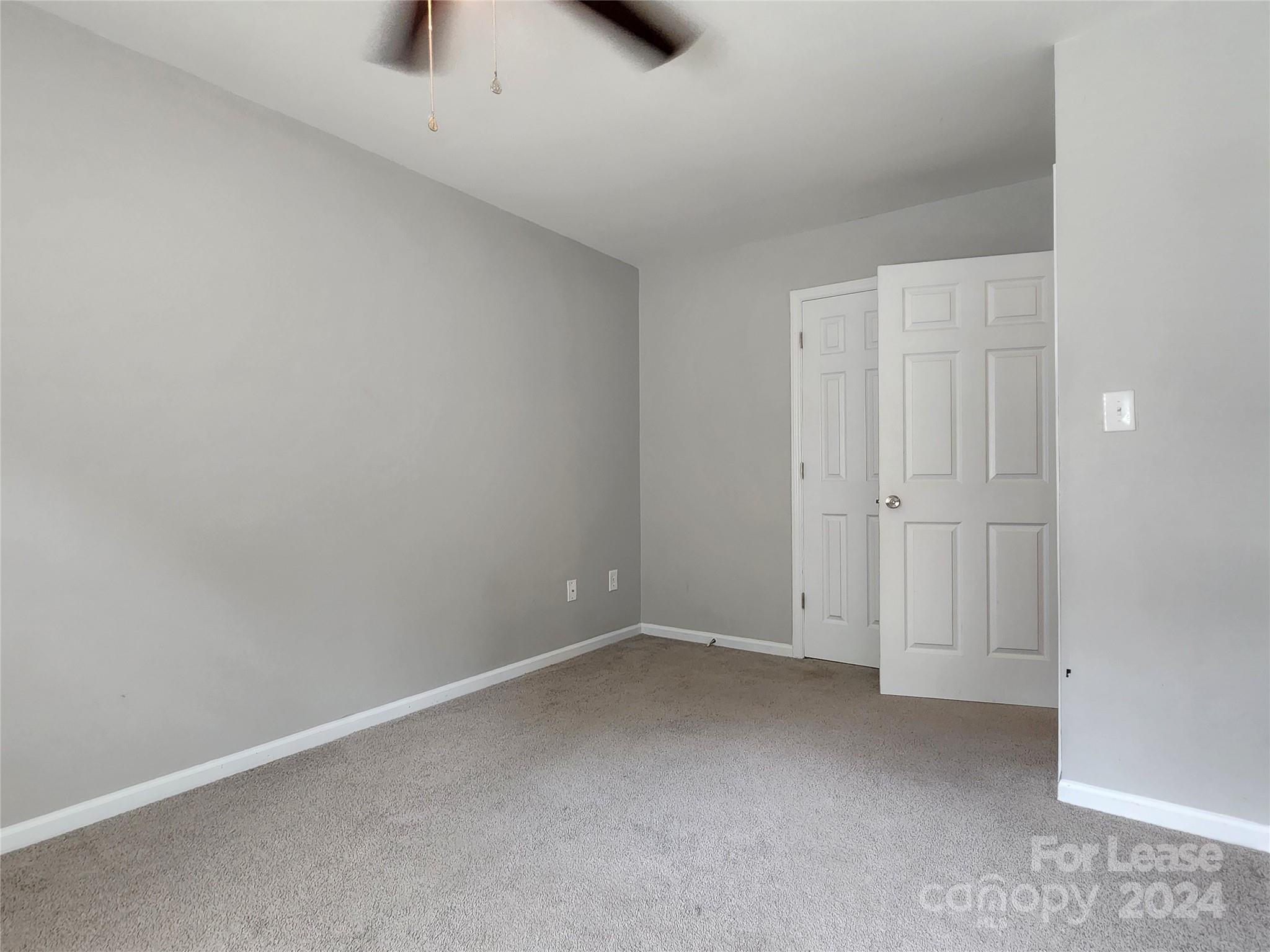 407 Spring Street Northwest, Unit 407 Concord, NC 28025 - Photo 17 of 19 a view of an empty room