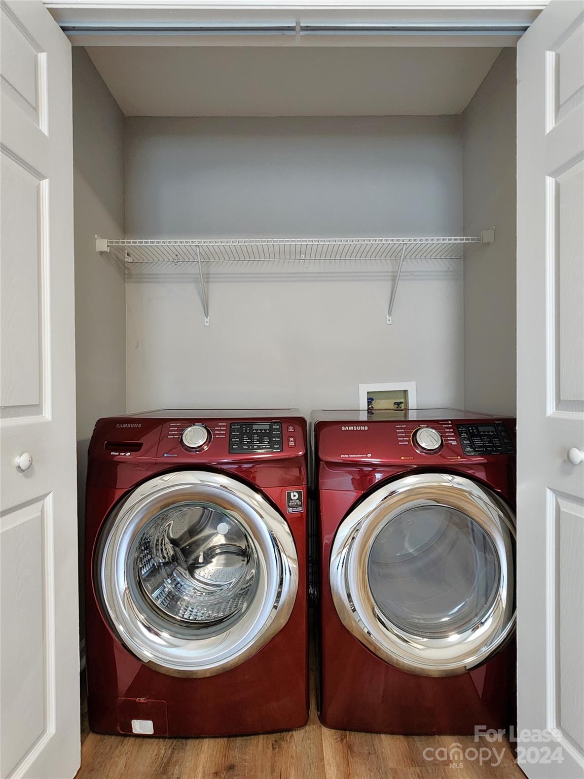 407 Spring Street Northwest, Unit 407 Concord, NC 28025 - Photo 7 of 19 a utility room with dryer and washer