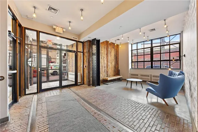 a view of a city with tall buildings