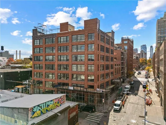 a view of city with tall buildings