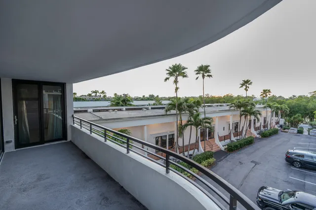 a view of a balcony with city view