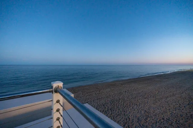 a view of ocean from a balcony