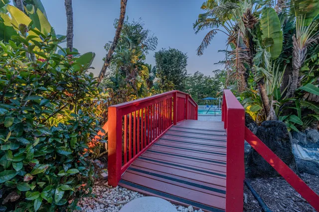 a view of a balcony with chairs