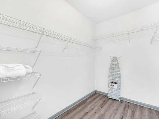 a view of a room with racks on the wall