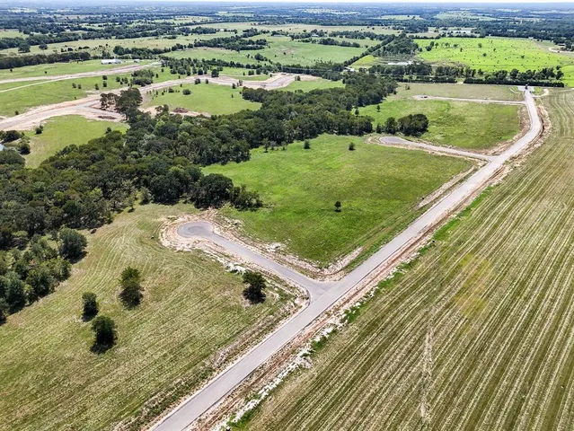 a view of a swimming pool and an outdoor space