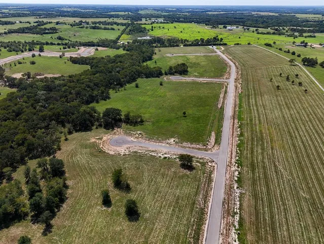 a view of a lake with a beach