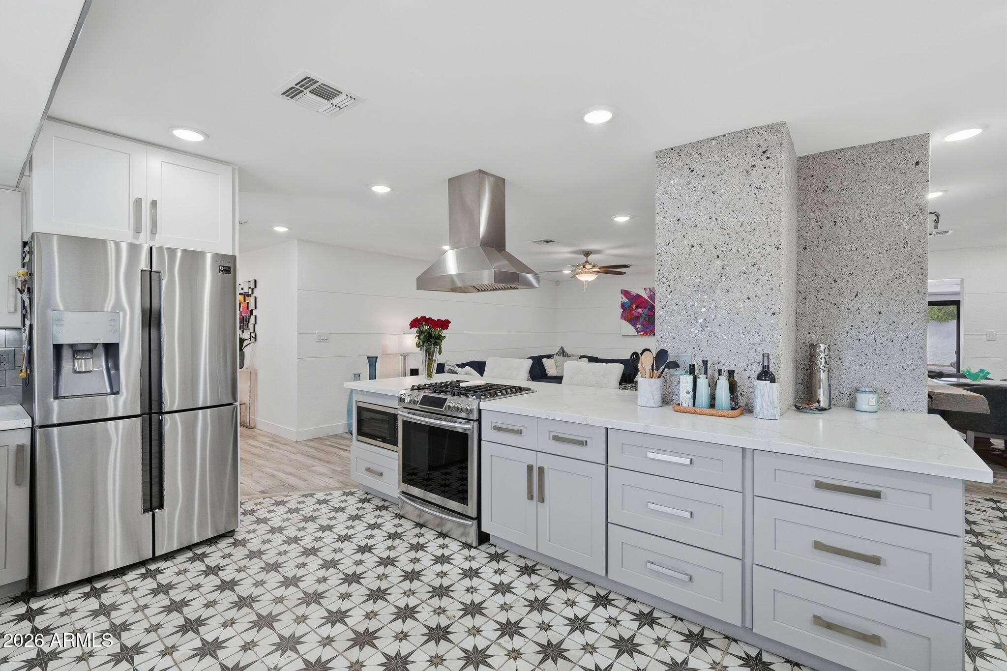 5149 North 34th Street Phoenix, AZ 85018 - Photo 20 of 70 a kitchen with stainless steel appliances sink refrigerator and cabinets