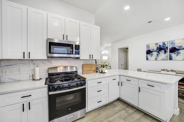 a view of a dining room with furniture