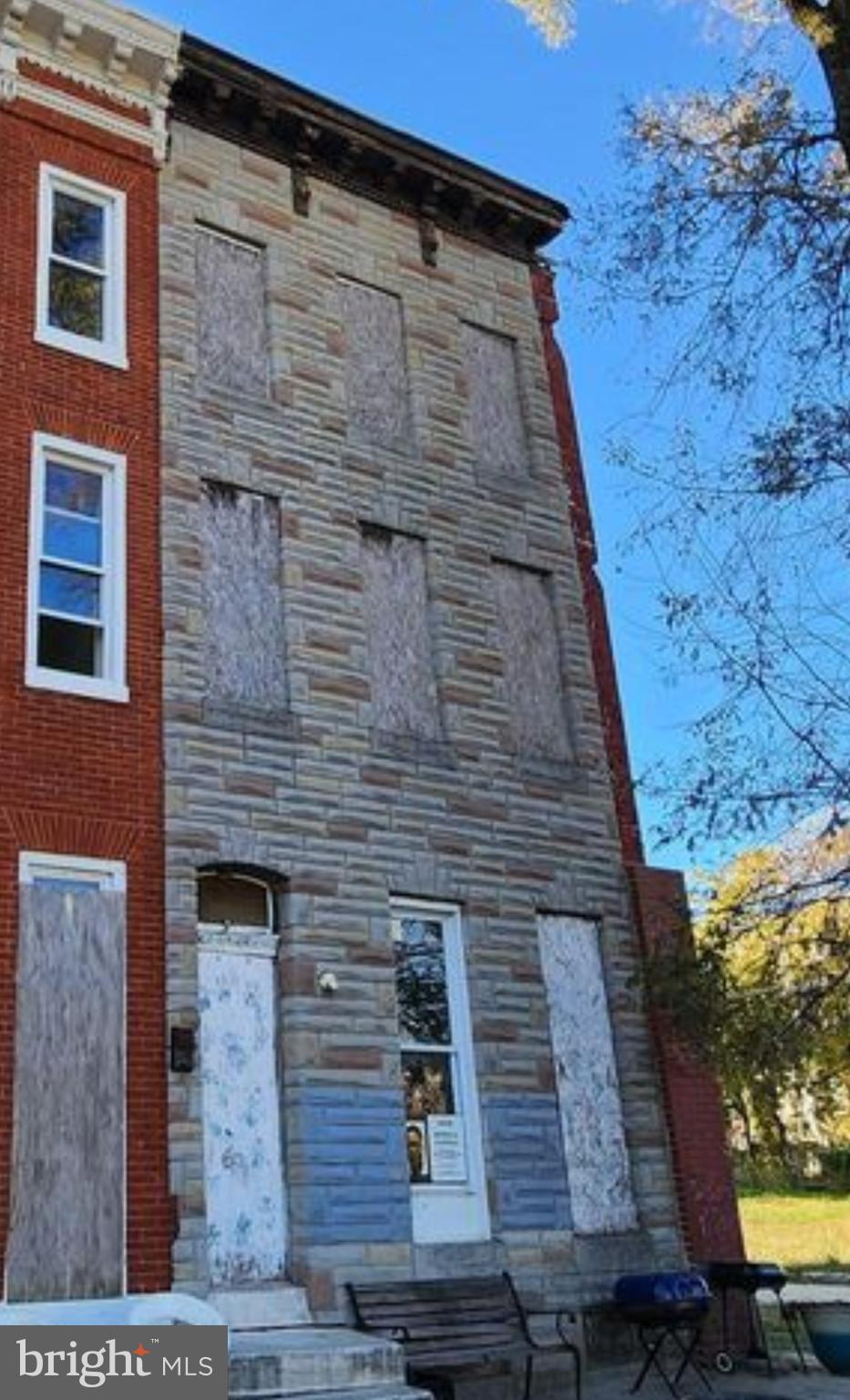 1417 Mosher Street Baltimore, MD 21217 - Photo 1 of 6 a brick building with a yard