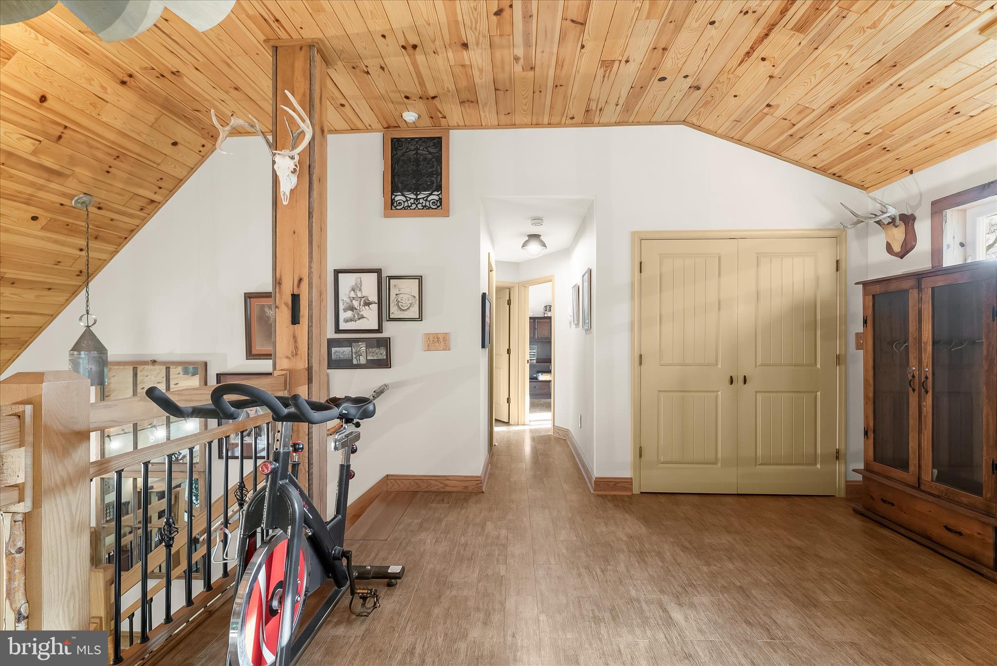 4623 Fishers Hollow Road Myersville, MD 21773 - Photo 49 of 65 a view of a livingroom with wooden floor and windows
