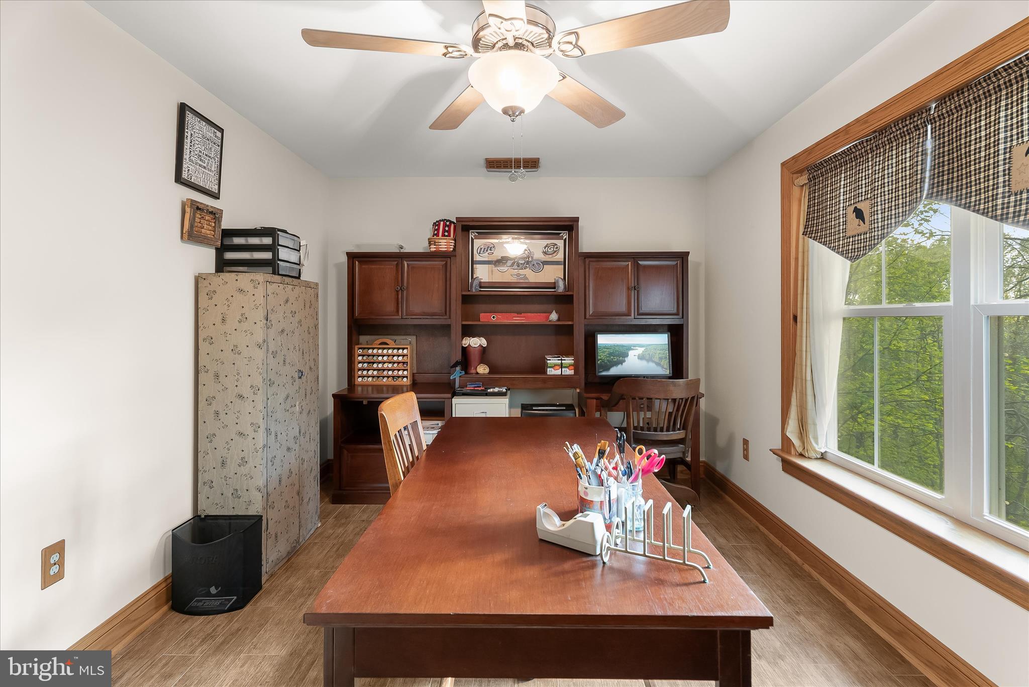 4623 Fishers Hollow Road Myersville, MD 21773 - Photo 51 of 65 a living room with furniture and a flat screen tv