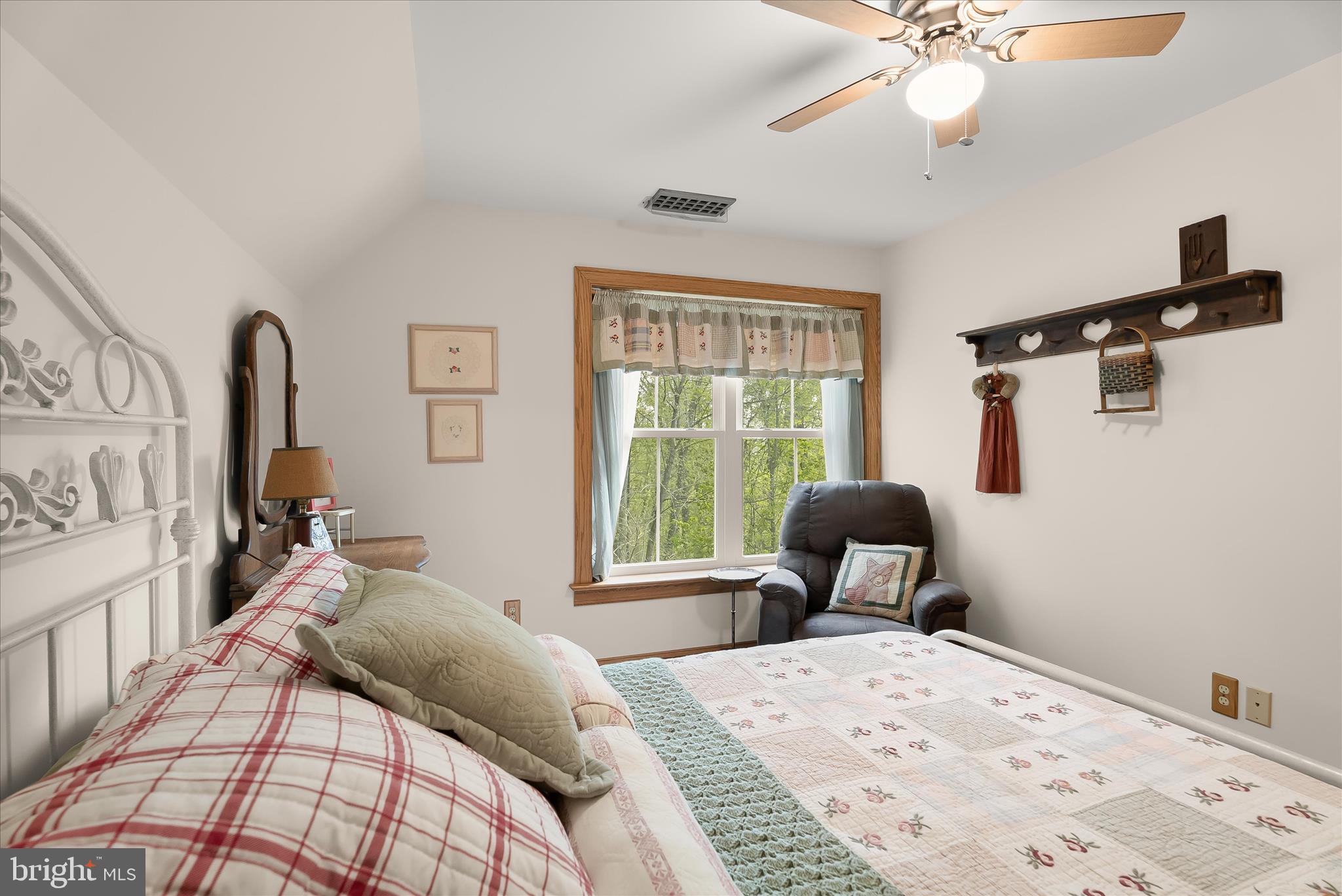 4623 Fishers Hollow Road Myersville, MD 21773 - Photo 54 of 65 a bedroom with a bed and wooden floor