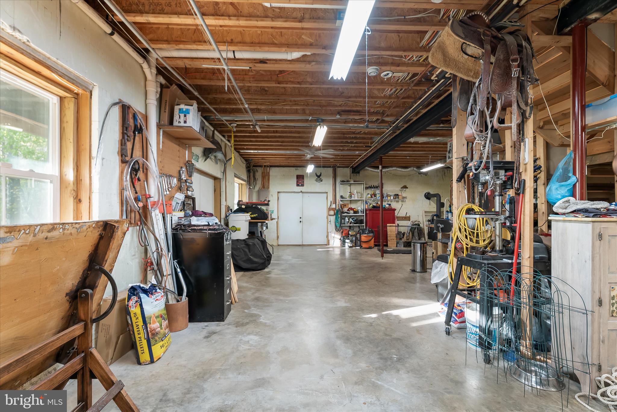 4623 Fishers Hollow Road Myersville, MD 21773 - Photo 56 of 65 a view of a storage room with a lot of stuff