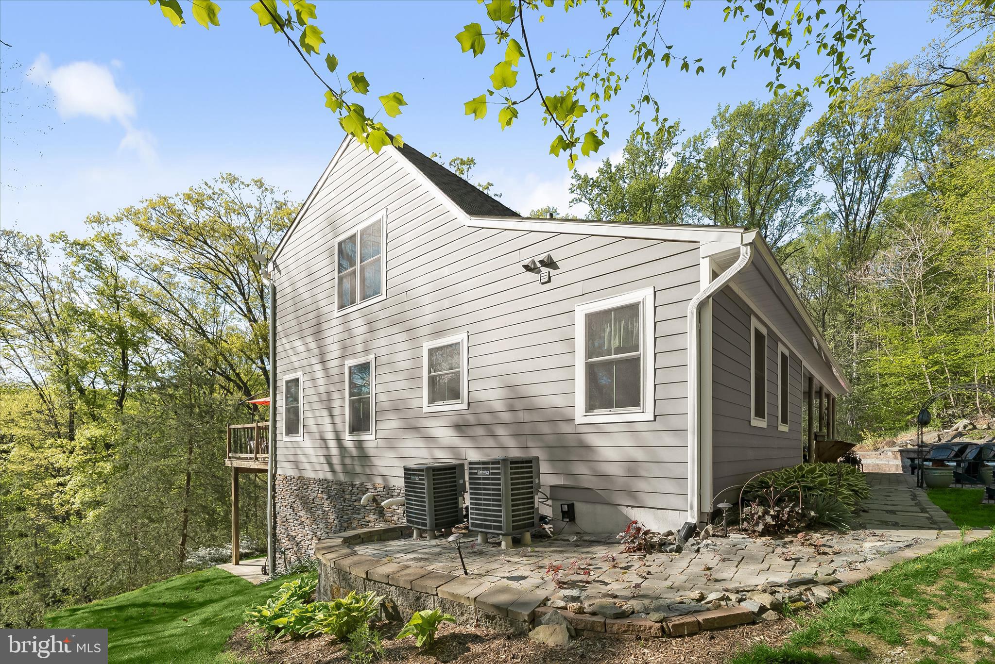4623 Fishers Hollow Road Myersville, MD 21773 - Photo 6 of 65 a view of a house with a yard