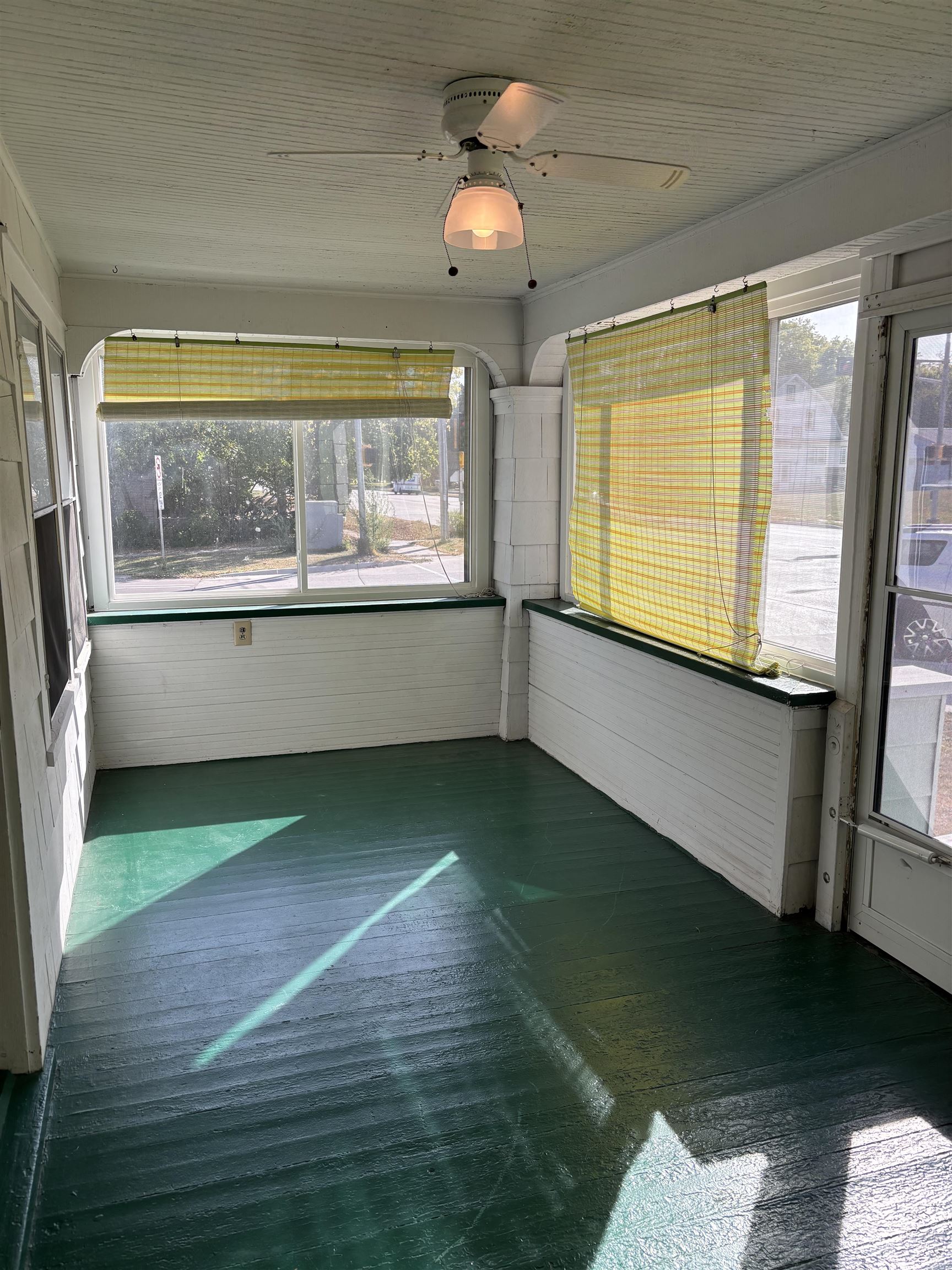 871 Cranston Road Beloit, WI 53511 - Photo 5 of 17 a view of an empty room with a window and wooden floor