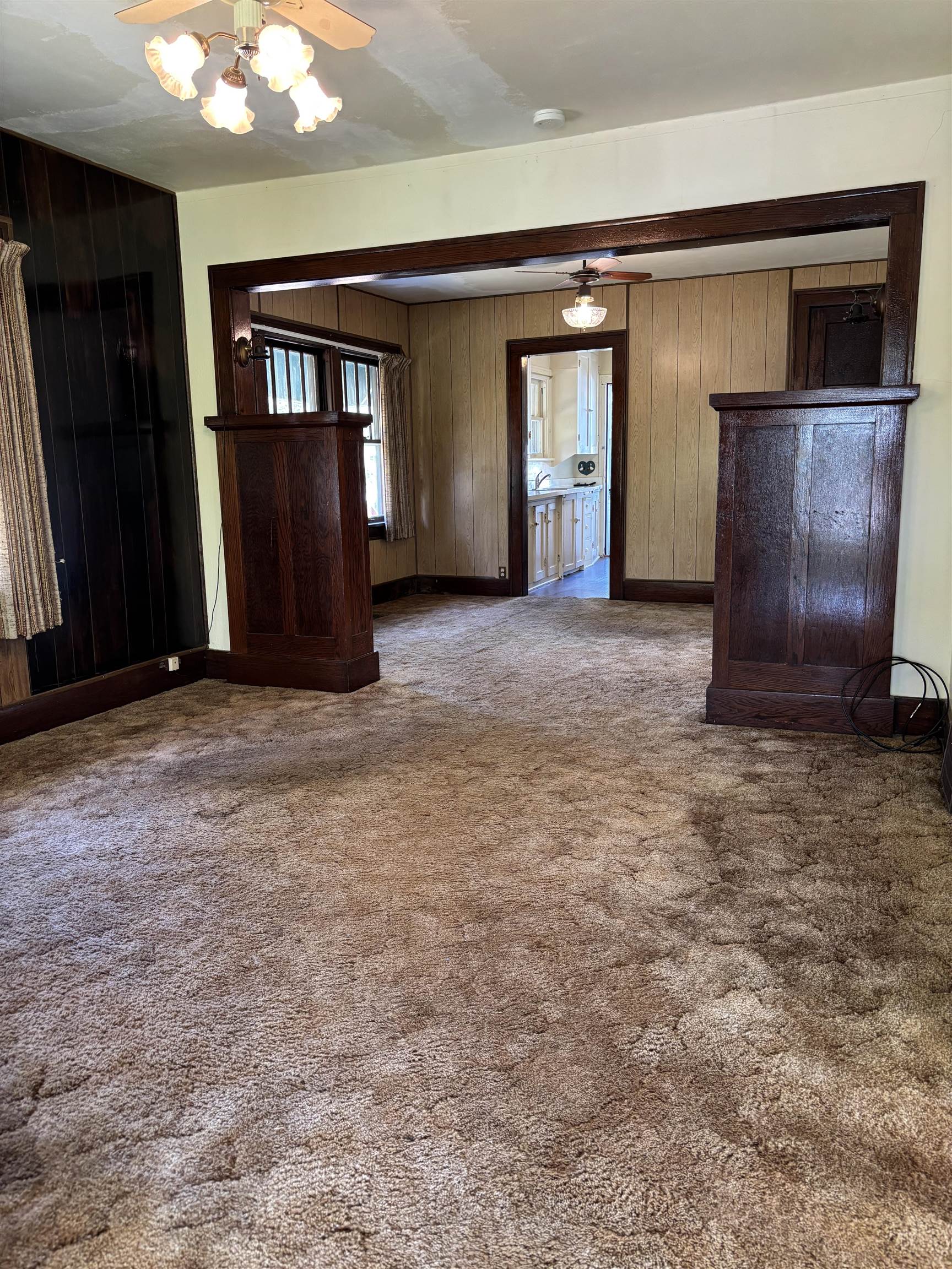 871 Cranston Road Beloit, WI 53511 - Photo 7 of 17 a view of an empty room with closet and a fireplace