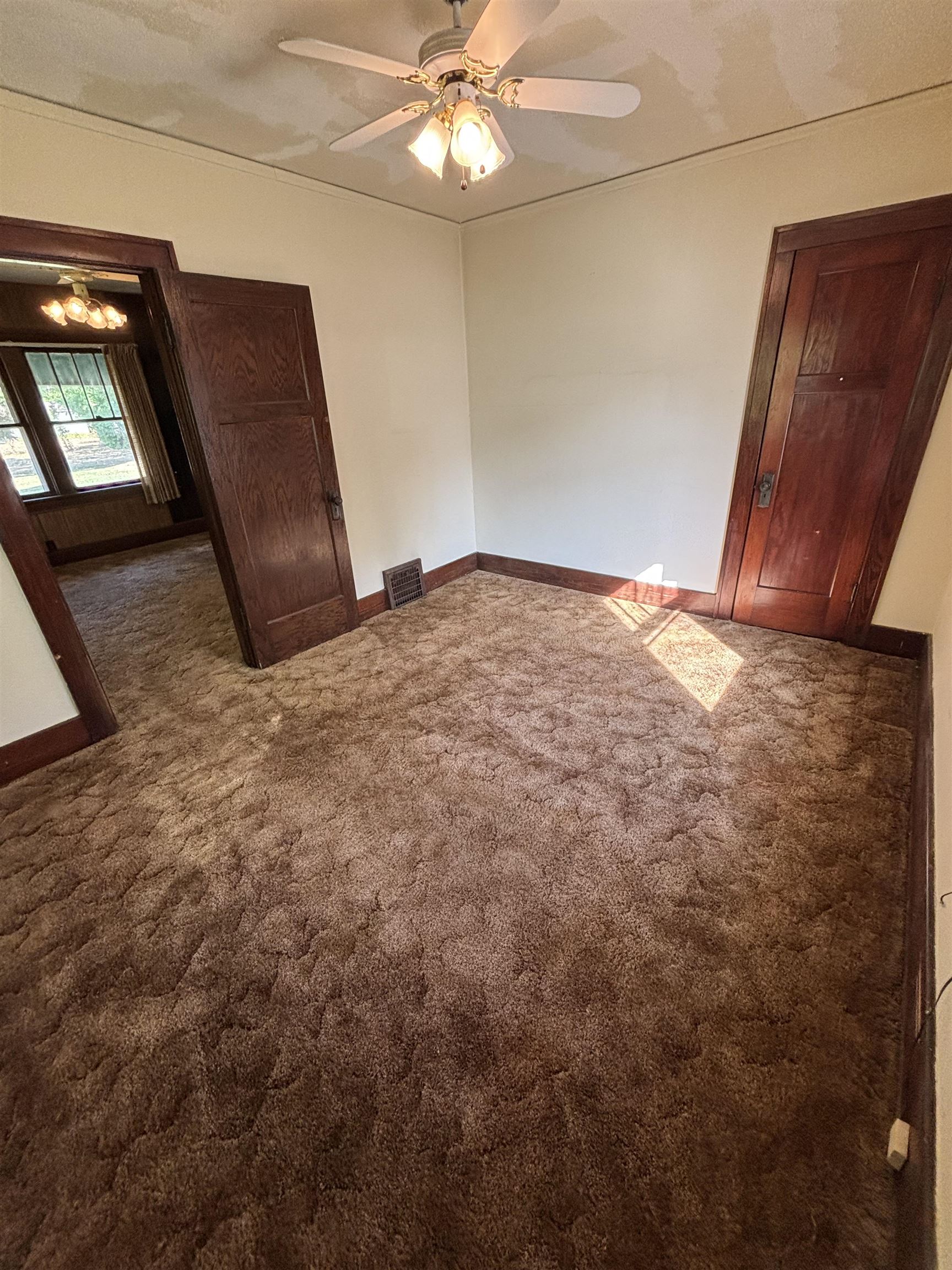 871 Cranston Road Beloit, WI 53511 - Photo 10 of 17 a view of an empty room with a mirror