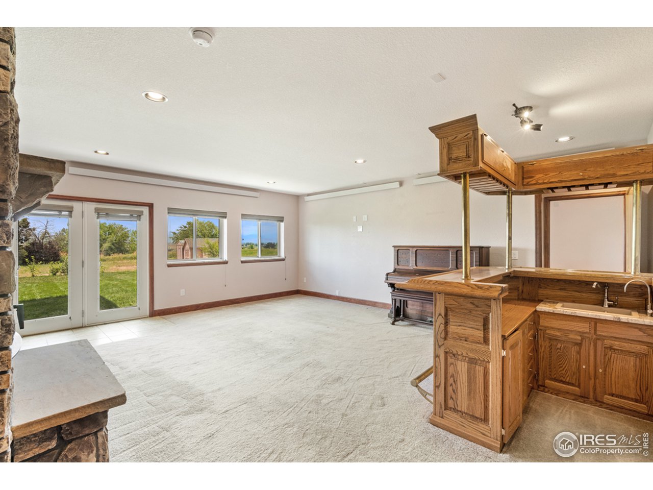 17622 County Road 1 Berthoud, CO 80513 - Photo 32 of 40 a open kitchen with a sink and a stove top oven