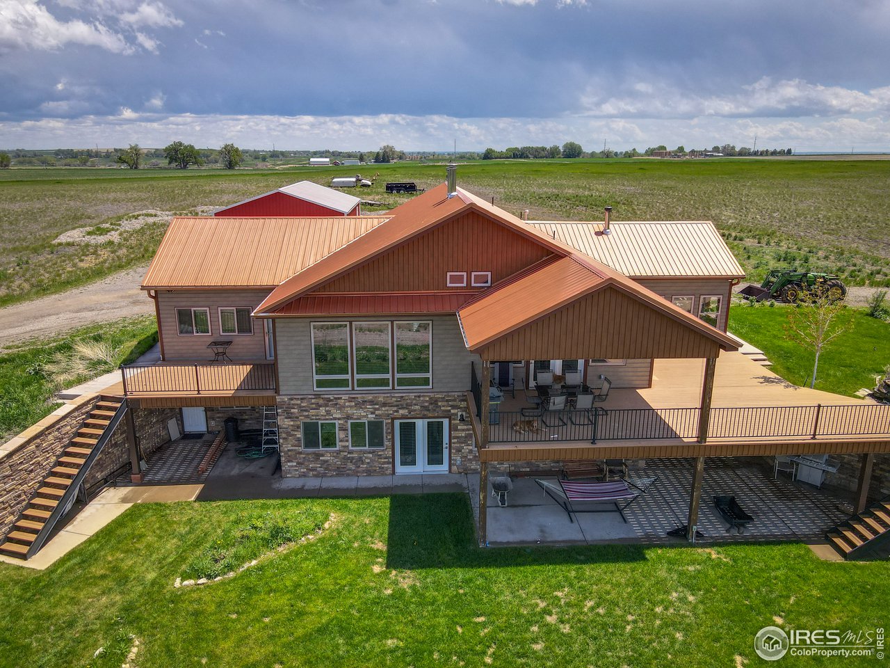 17622 County Road 1 Berthoud, CO 80513 - Photo 5 of 40 an outdoor space with furniture and garden
