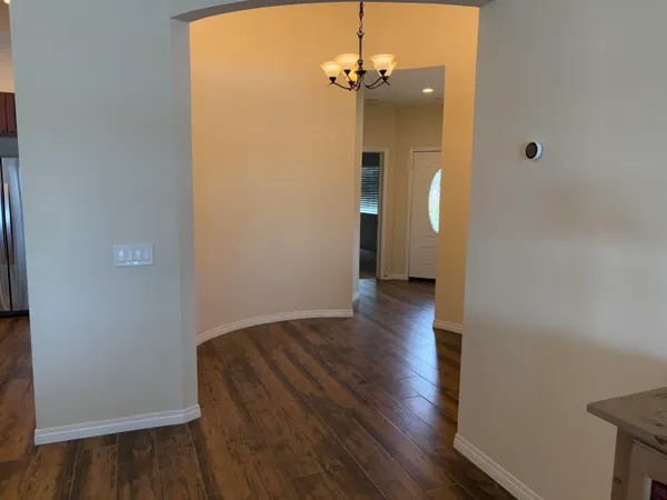 a bathroom with a shower and a sink