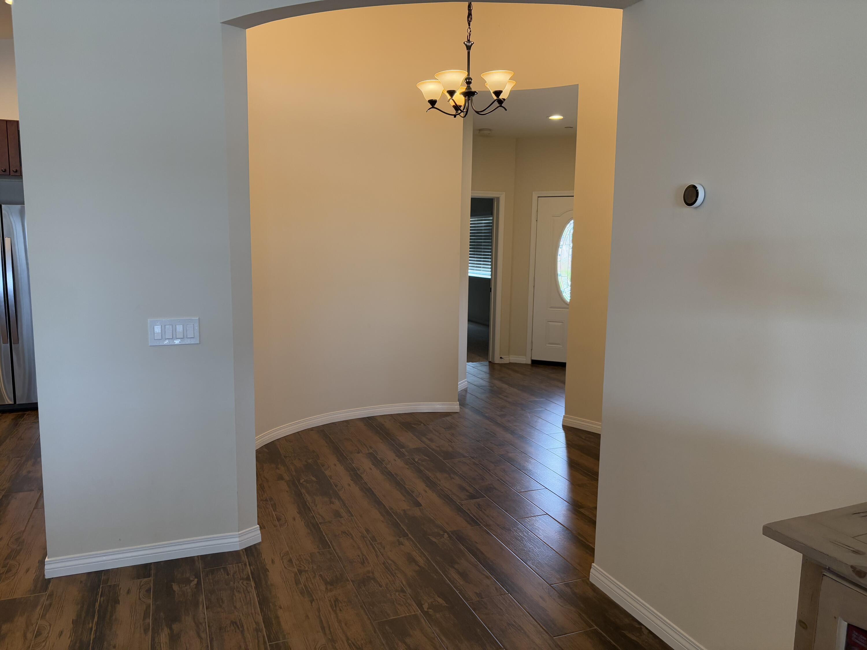 2674 Colorado River Road Blythe, CA 92225 - Photo 12 of 73 a view of a room with wooden floor