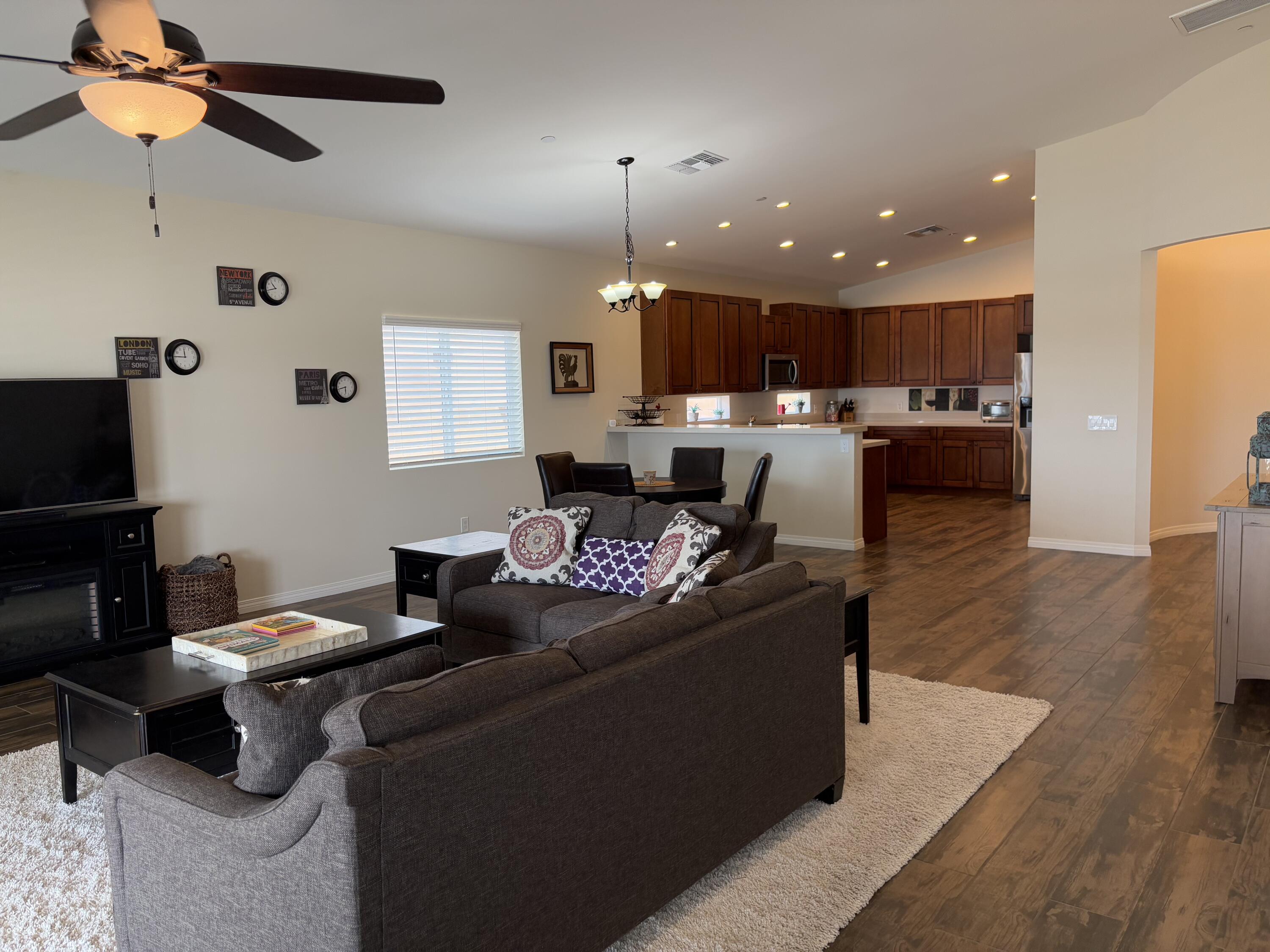 2674 Colorado River Road Blythe, CA 92225 - Photo 30 of 73 a living room with furniture a window and a flat screen tv