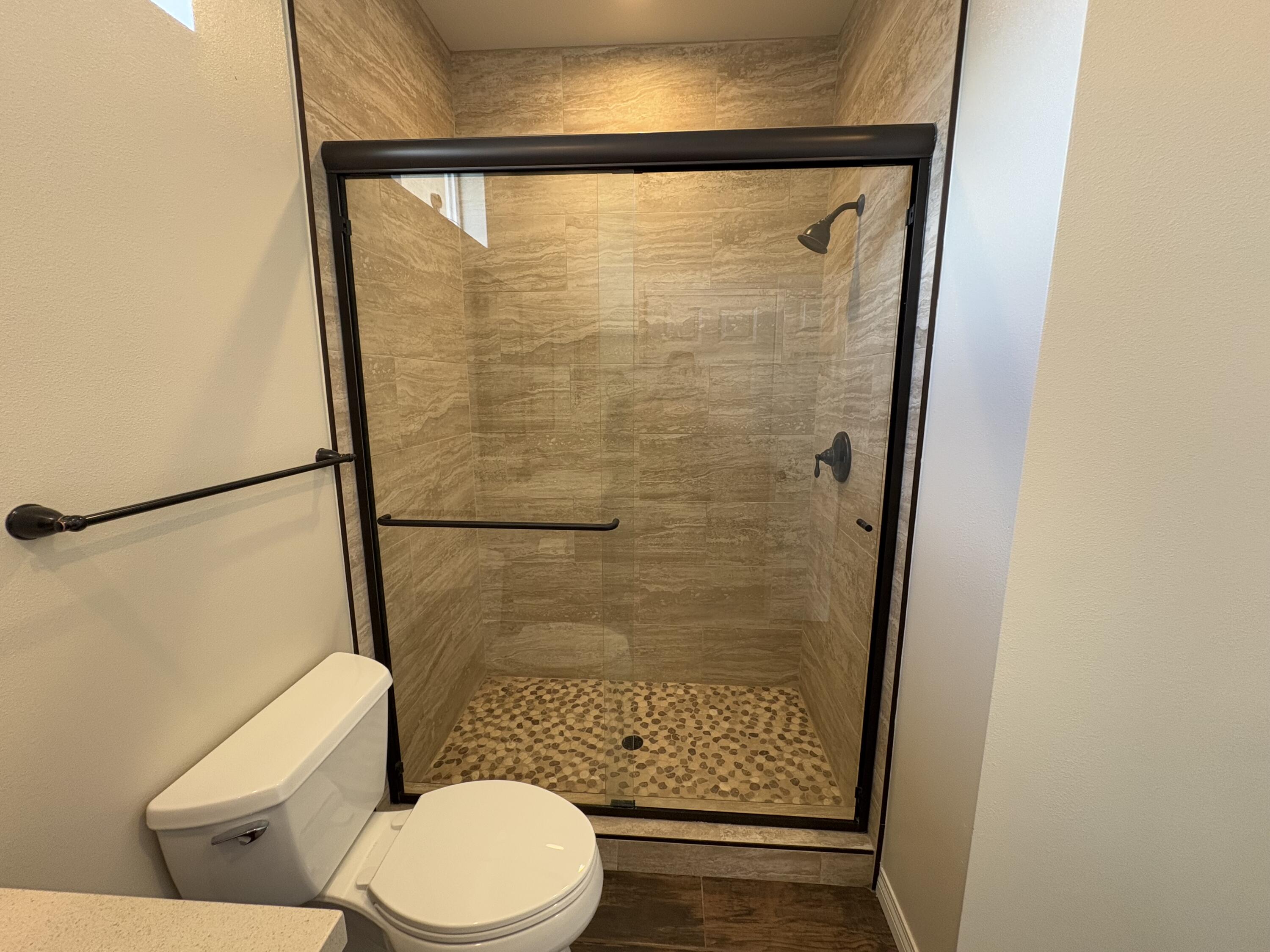 2674 Colorado River Road Blythe, CA 92225 - Photo 41 of 73 a bathroom with a shower and a toilet