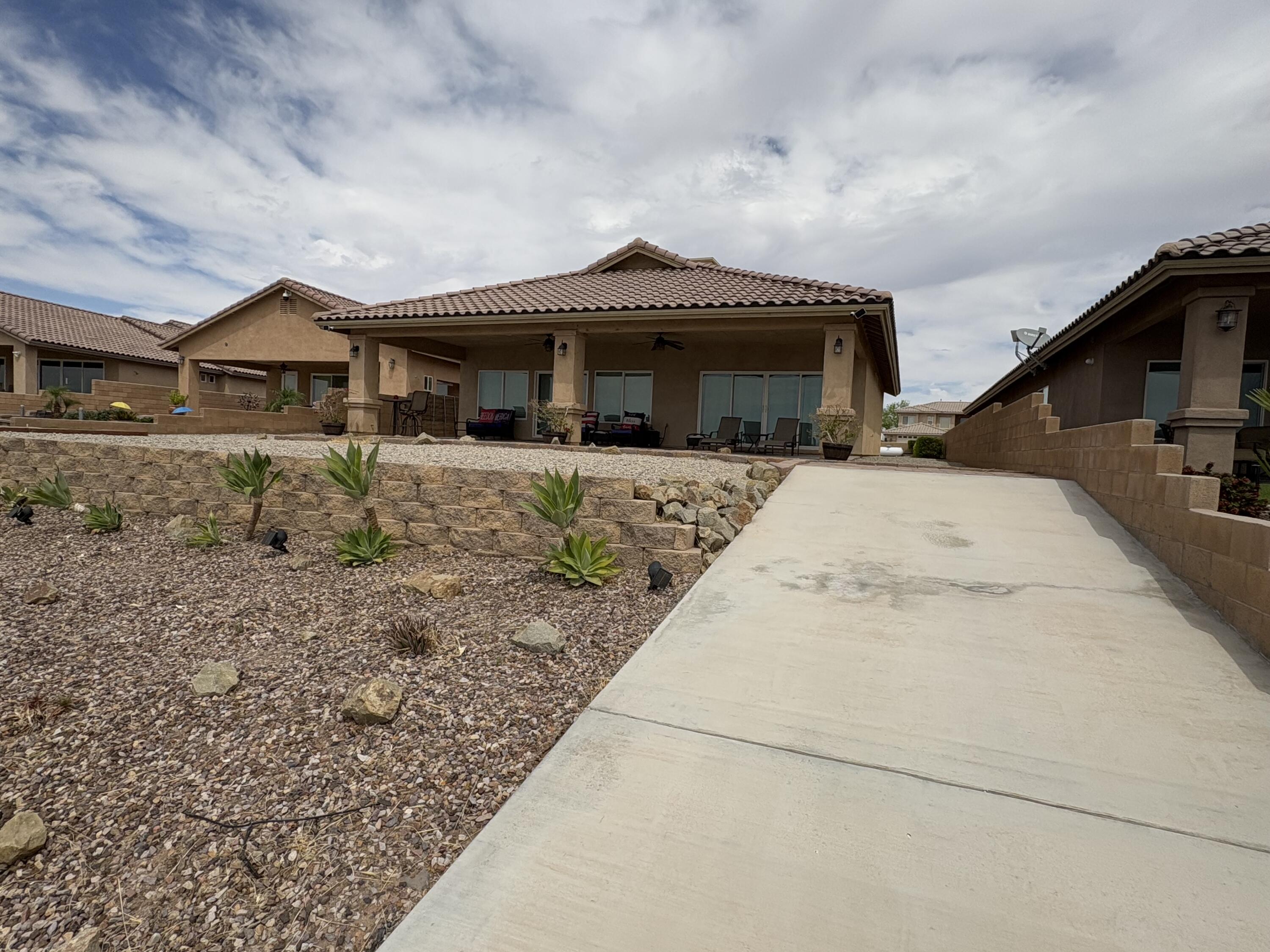 2674 Colorado River Road Blythe, CA 92225 - Photo 55 of 73 a front view of a house with a yard