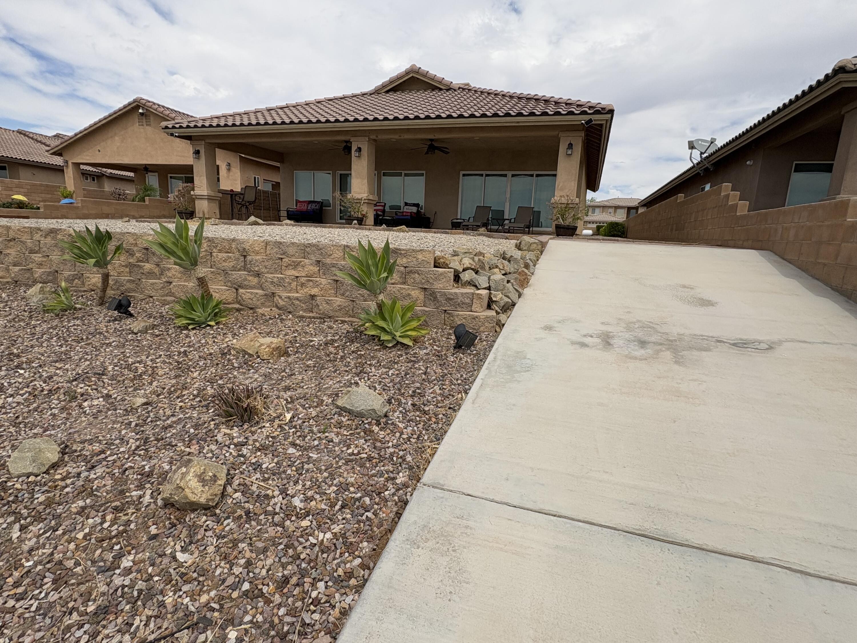 2674 Colorado River Road Blythe, CA 92225 - Photo 57 of 73 a front view of a house with a yard