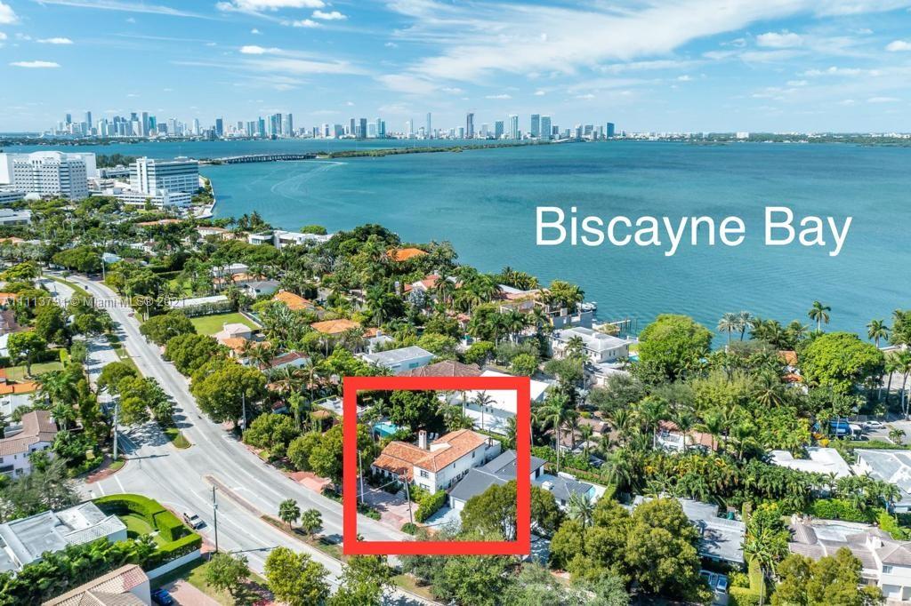 4444 Alton Road Miami Beach, FL 33140 - Photo 3 of 55 a view of a lake with a building in the background
