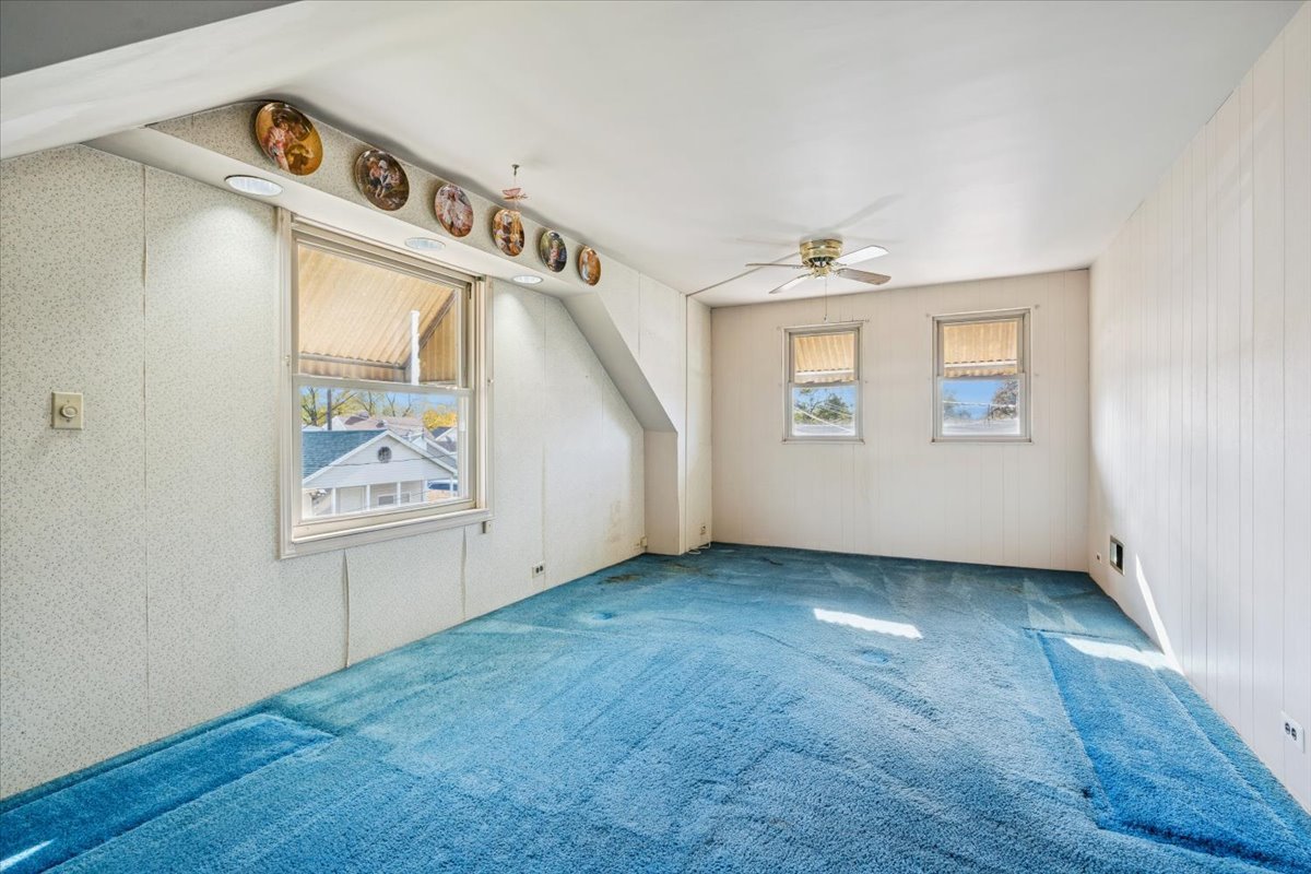 7841 44th Street Lyons, IL 60534 - Photo 14 of 23 an empty room with windows