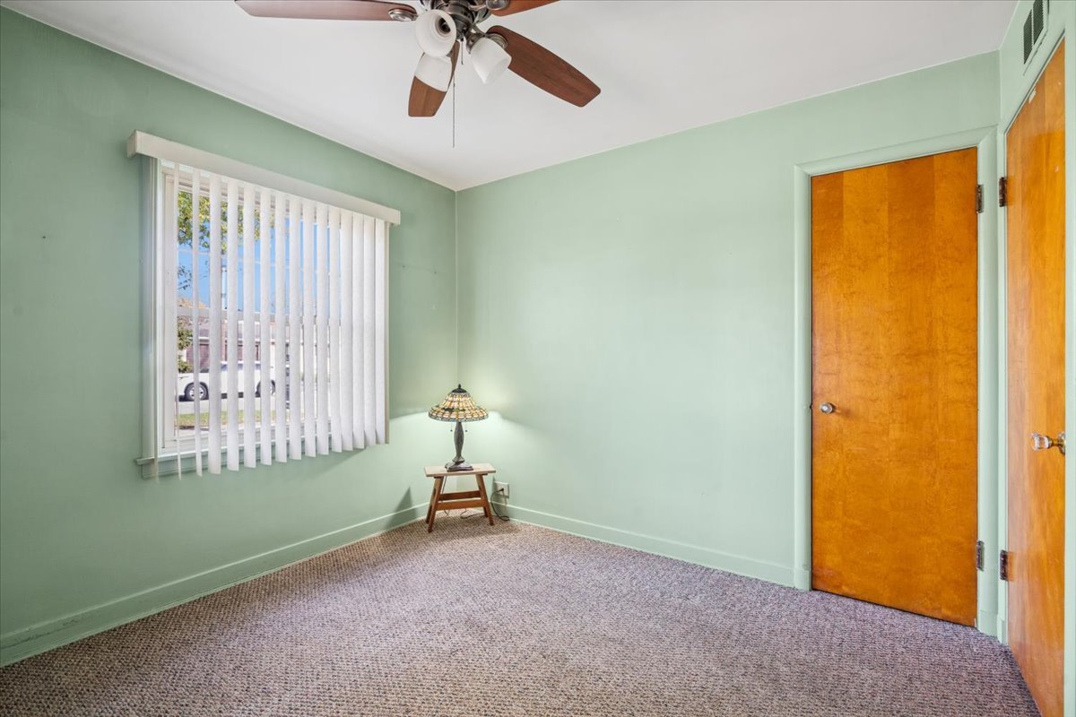 7841 44th Street Lyons, IL 60534 - Photo 10 of 23 an empty room with a window