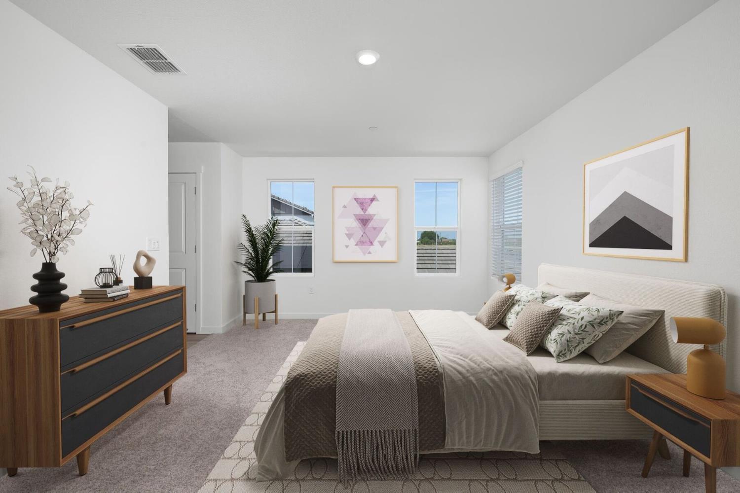 820 Chatham Lane Patterson, CA 95363 - Photo 9 of 19 a bedroom with a bed and a lamp on dresser