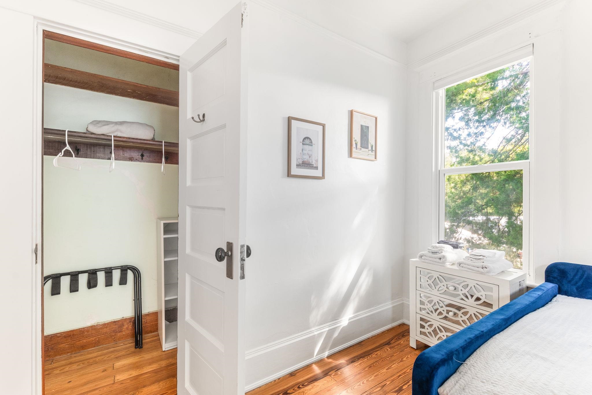 21 Saragossa Street St. Augustine, FL 32084 - Photo 12 of 66 Bedroom with light wood-style floors and a walk in closet