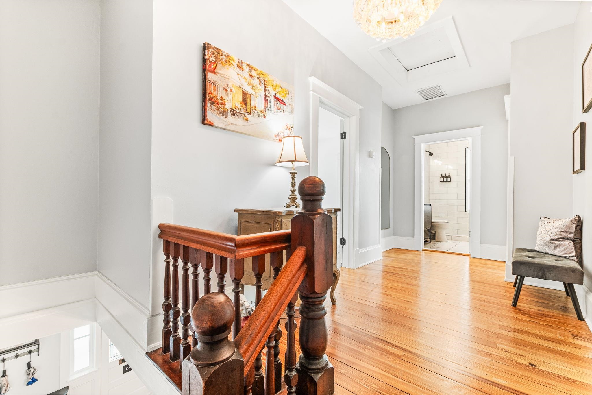 21 Saragossa Street St. Augustine, FL 32084 - Photo 34 of 66 Hallway featuring an upstairs landing and light wood-style flooring