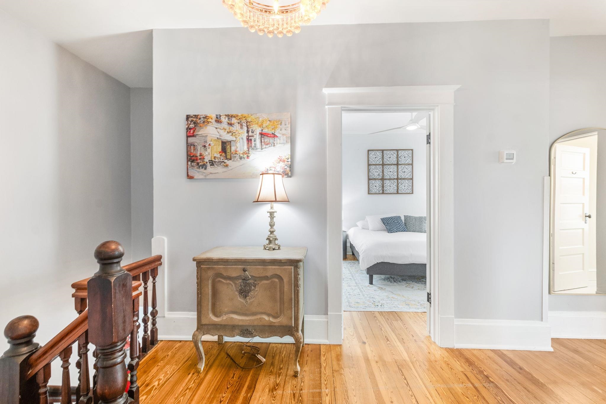 21 Saragossa Street St. Augustine, FL 32084 - Photo 44 of 66 Hallway with hardwood / wood-style floors and arched walkways