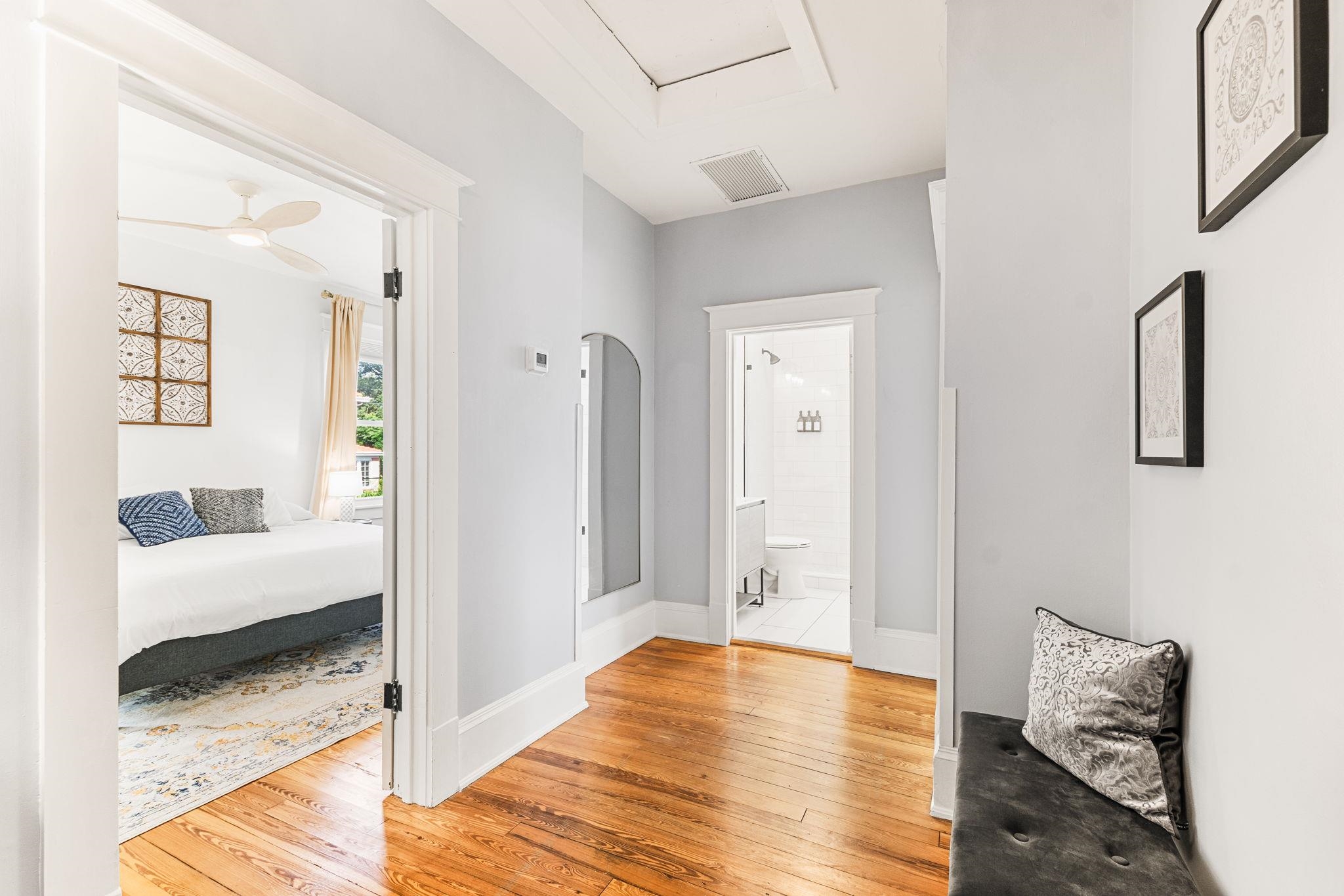 21 Saragossa Street St. Augustine, FL 32084 - Photo 45 of 66 Hallway featuring light wood-type flooring and baseboards