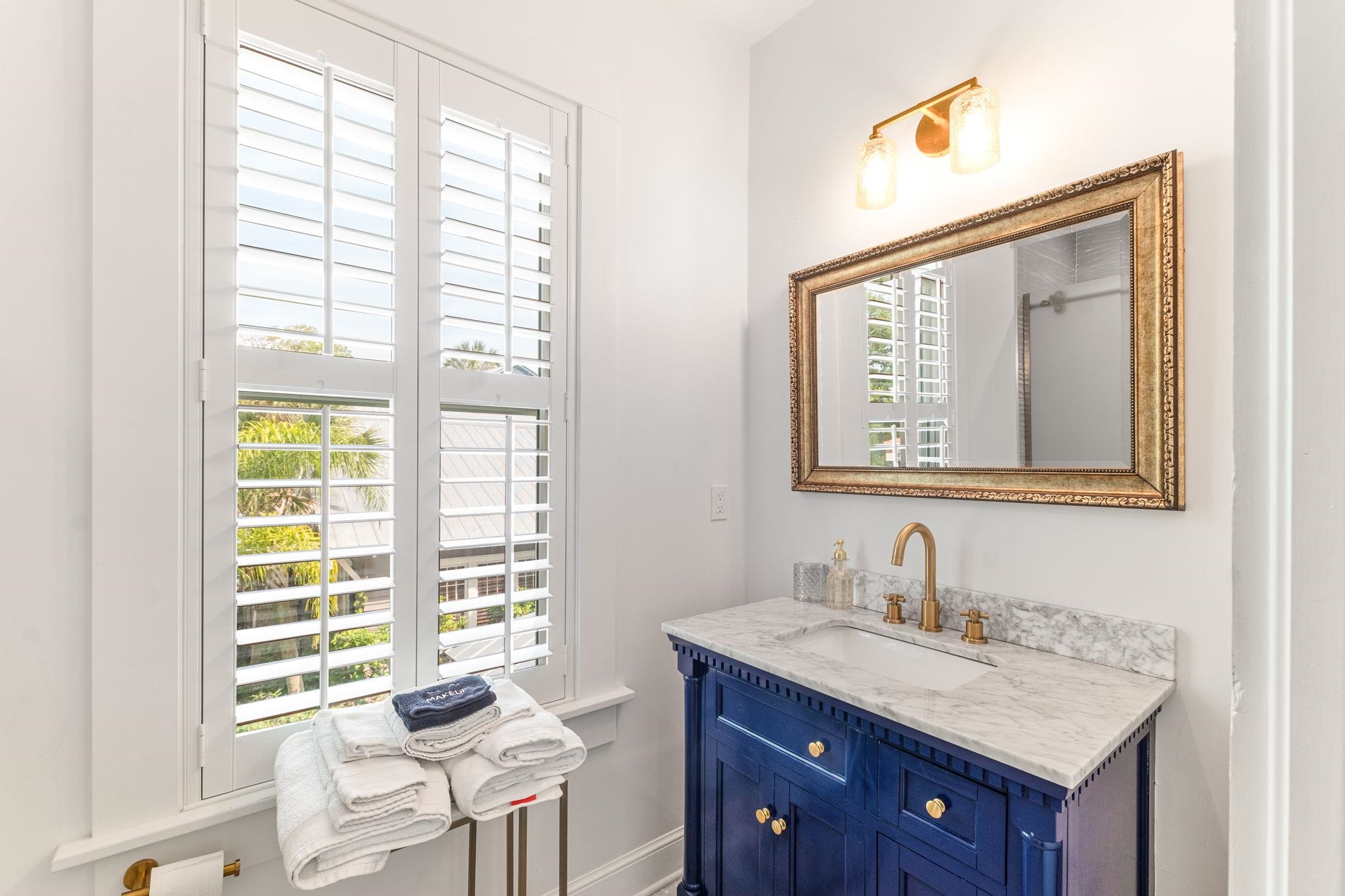 21 Saragossa Street St. Augustine, FL 32084 - Photo 49 of 66 Bathroom featuring vanity and baseboards