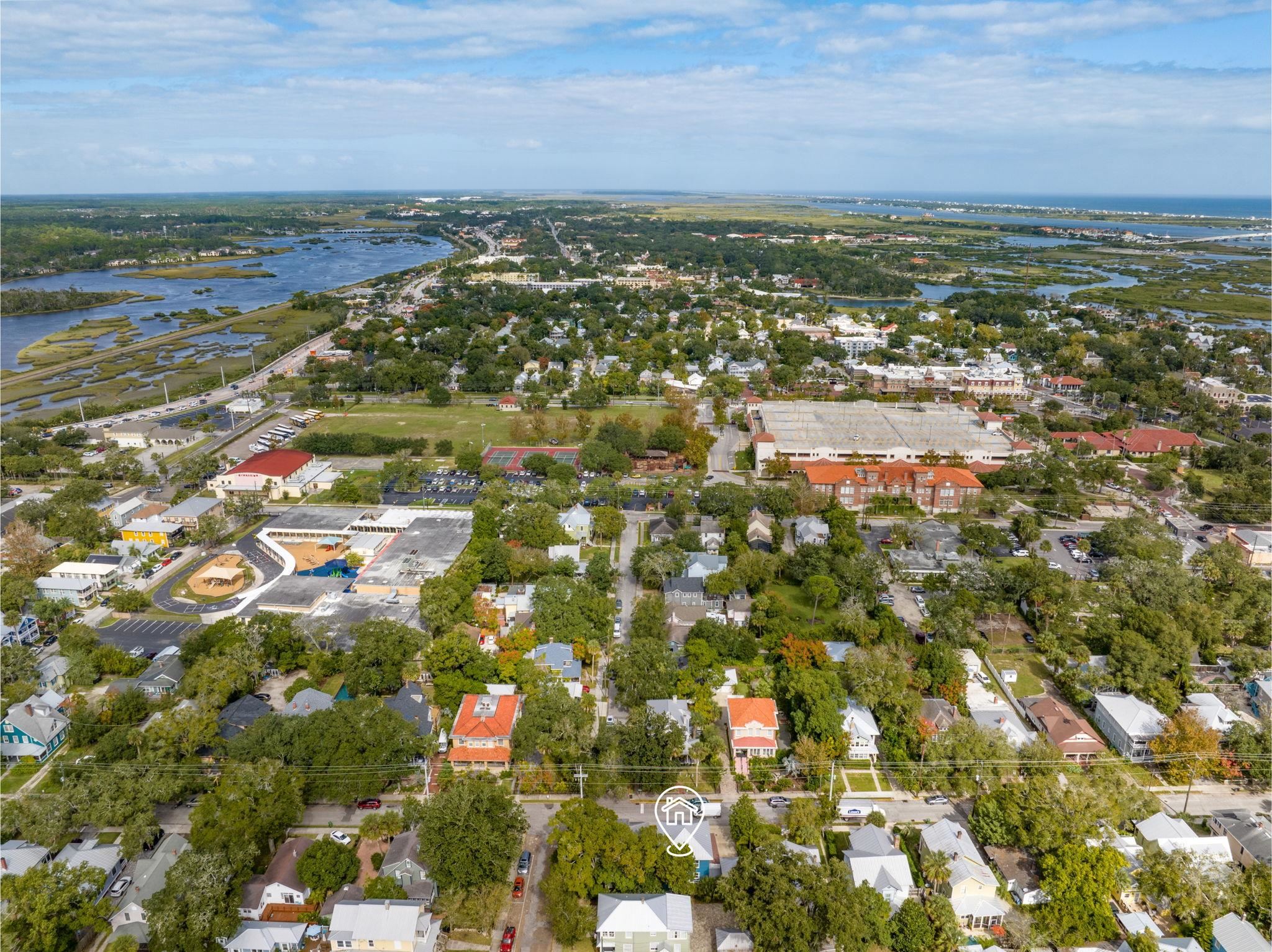 21 Saragossa Street St. Augustine, FL 32084 - Photo 60 of 66 Aerial overview of property's location with a large body of water and nearby suburban area
