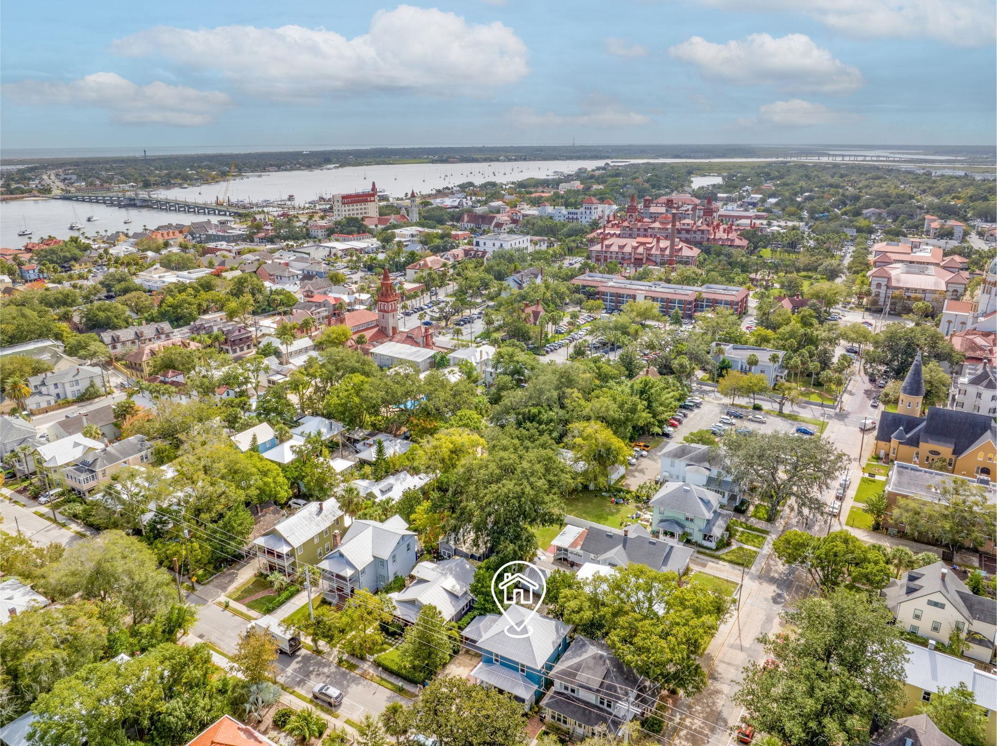 21 Saragossa Street St. Augustine, FL 32084 - Photo 63 of 66 Aerial perspective of suburban area featuring a notable bridge and a large body of water