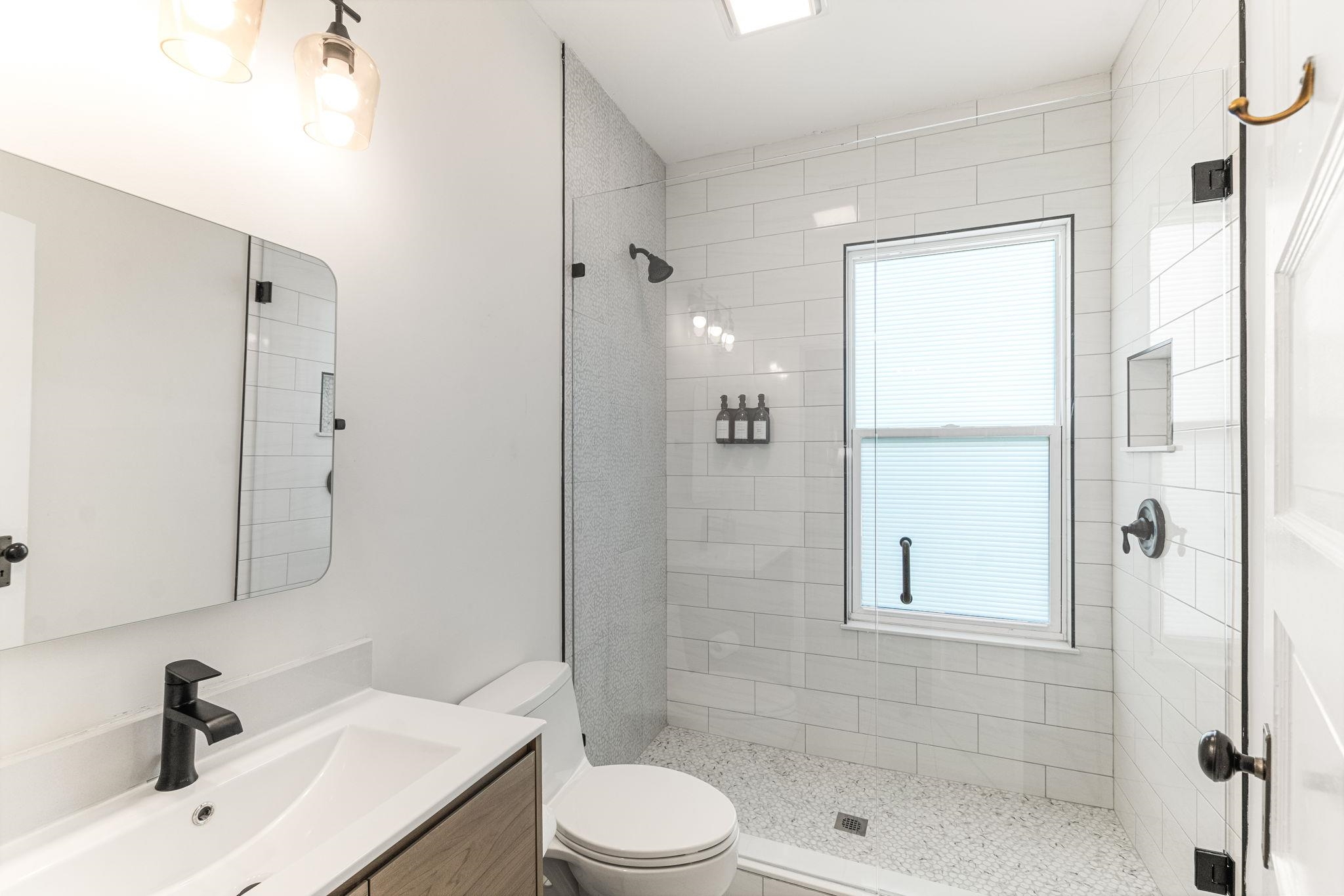 21 Saragossa Street St. Augustine, FL 32084 - Photo 66 of 66 Bathroom featuring vanity and a stall shower