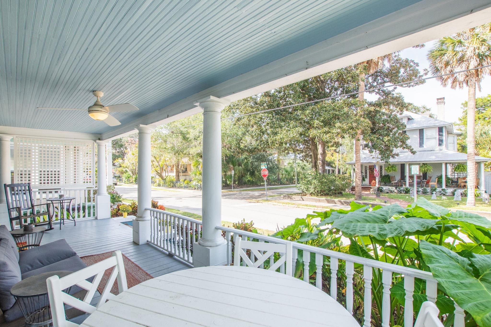 21 Saragossa Street St. Augustine, FL 32084 - Photo 9 of 66 Porch featuring ceiling fan and outdoor dining area