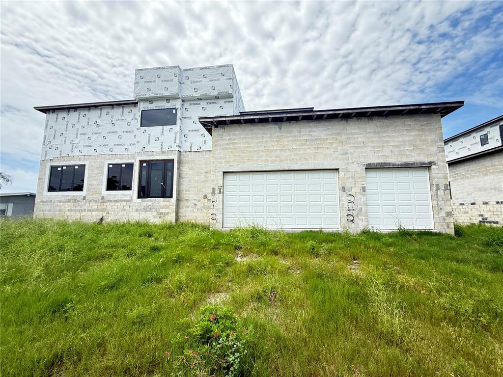 a view of a house with a garden