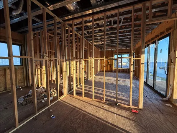 a view of hallway with windows