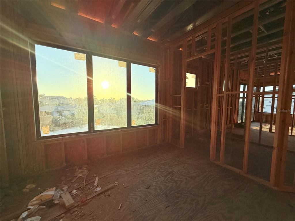 242 Bangsberg Road Southeast Port Charlotte, FL 33952 - Photo 15 of 18 a view of hallway with windows