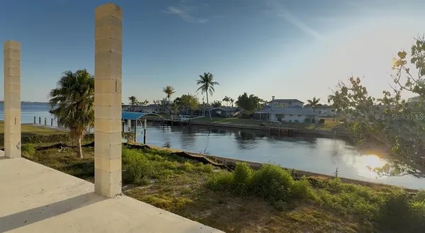 a view of a lake with boats