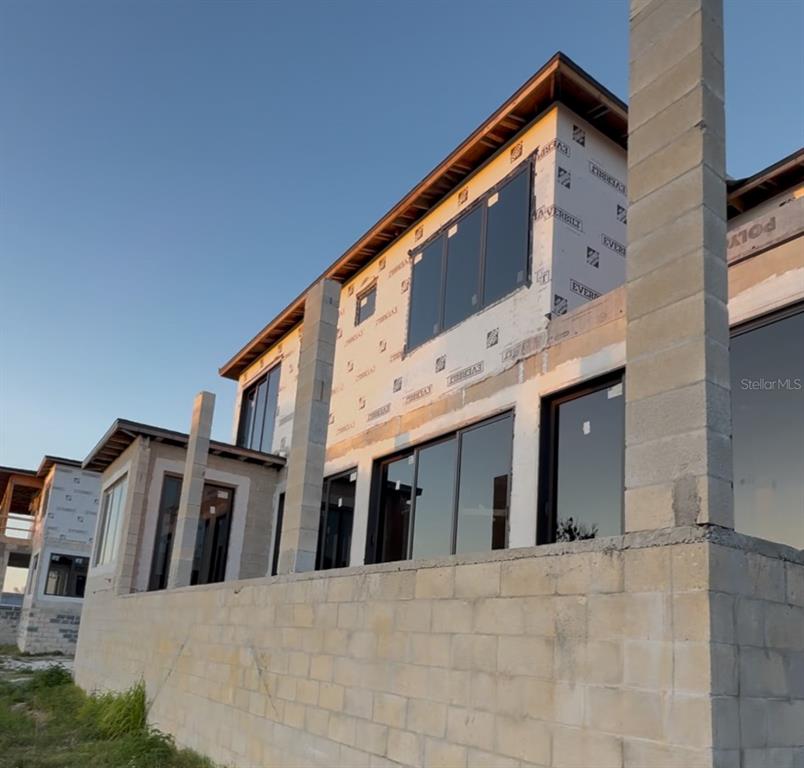 242 Bangsberg Road Southeast Port Charlotte, FL 33952 - Photo 4 of 18 a view of a house with a street