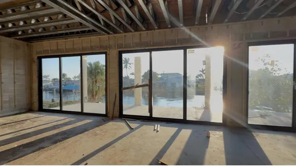 a bathroom with a glass shower door