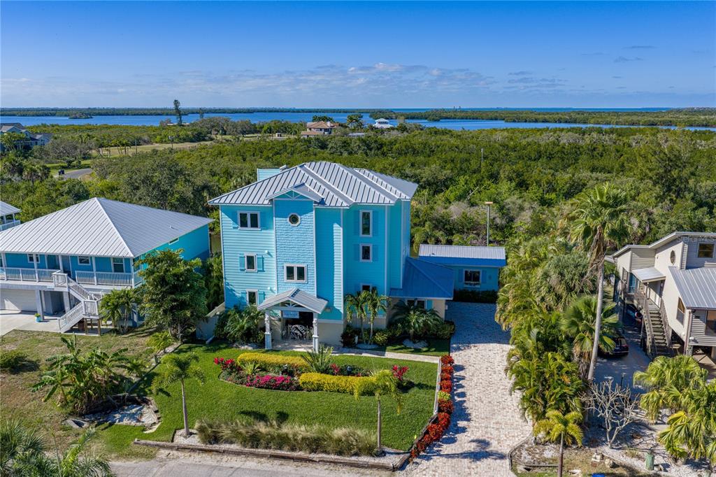 125 Burns Road Terra Ceia, FL 34250 - Photo 2 of 90 an aerial view of a house